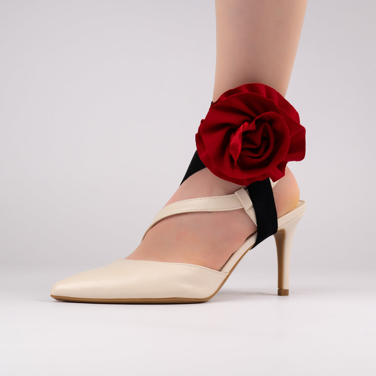 Red rose LYNKS straps styled on a cream slingback heel