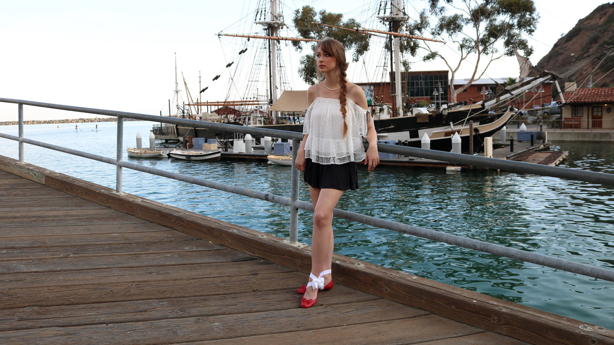 LYNKS Marina Muse fashion campaign with statement shoe accessories